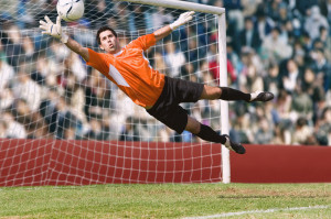 Goalkeeper Diving for a Save