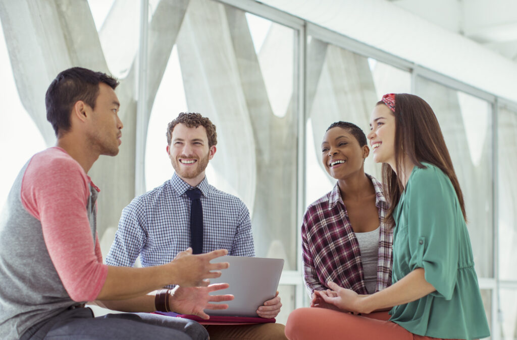 Multi-ethnic business people meeting in an open space