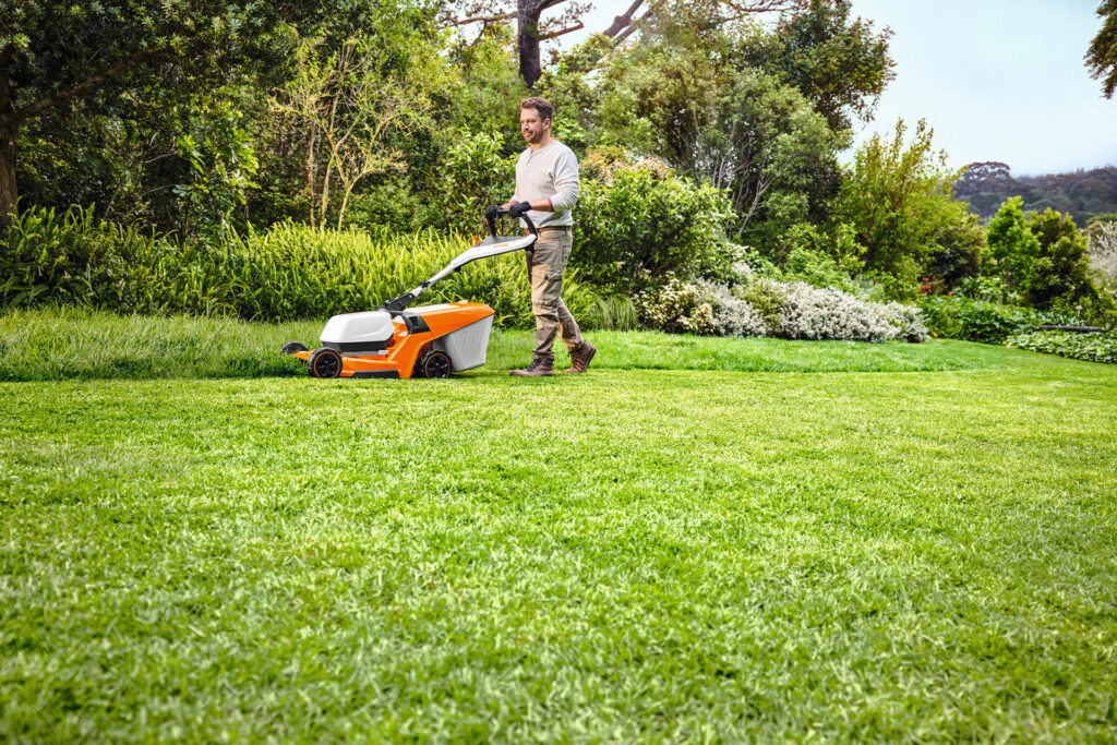 Man using STIHL lawn mower