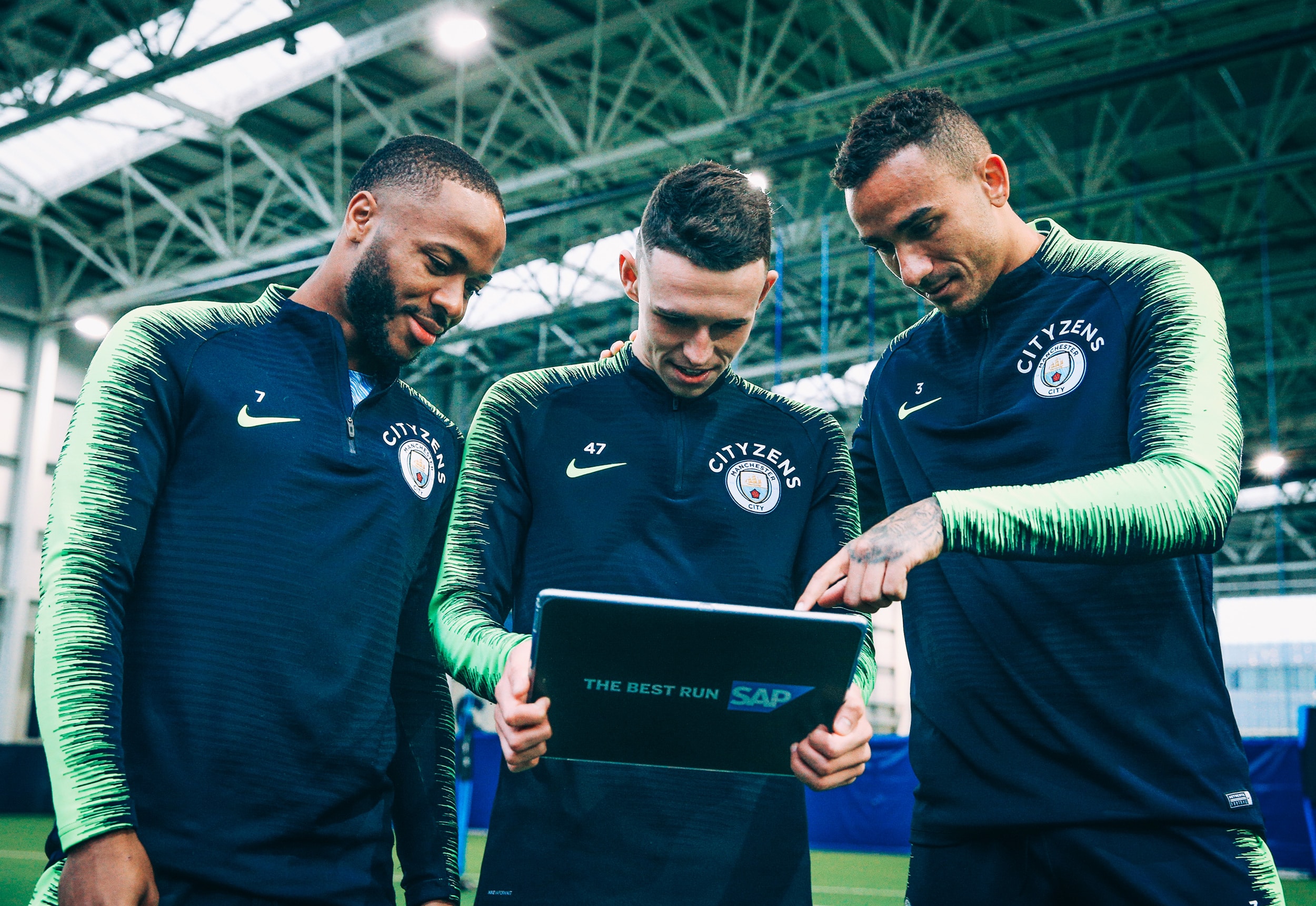 Manchester City players Raheem Sterling, Phil Foden, Danilo